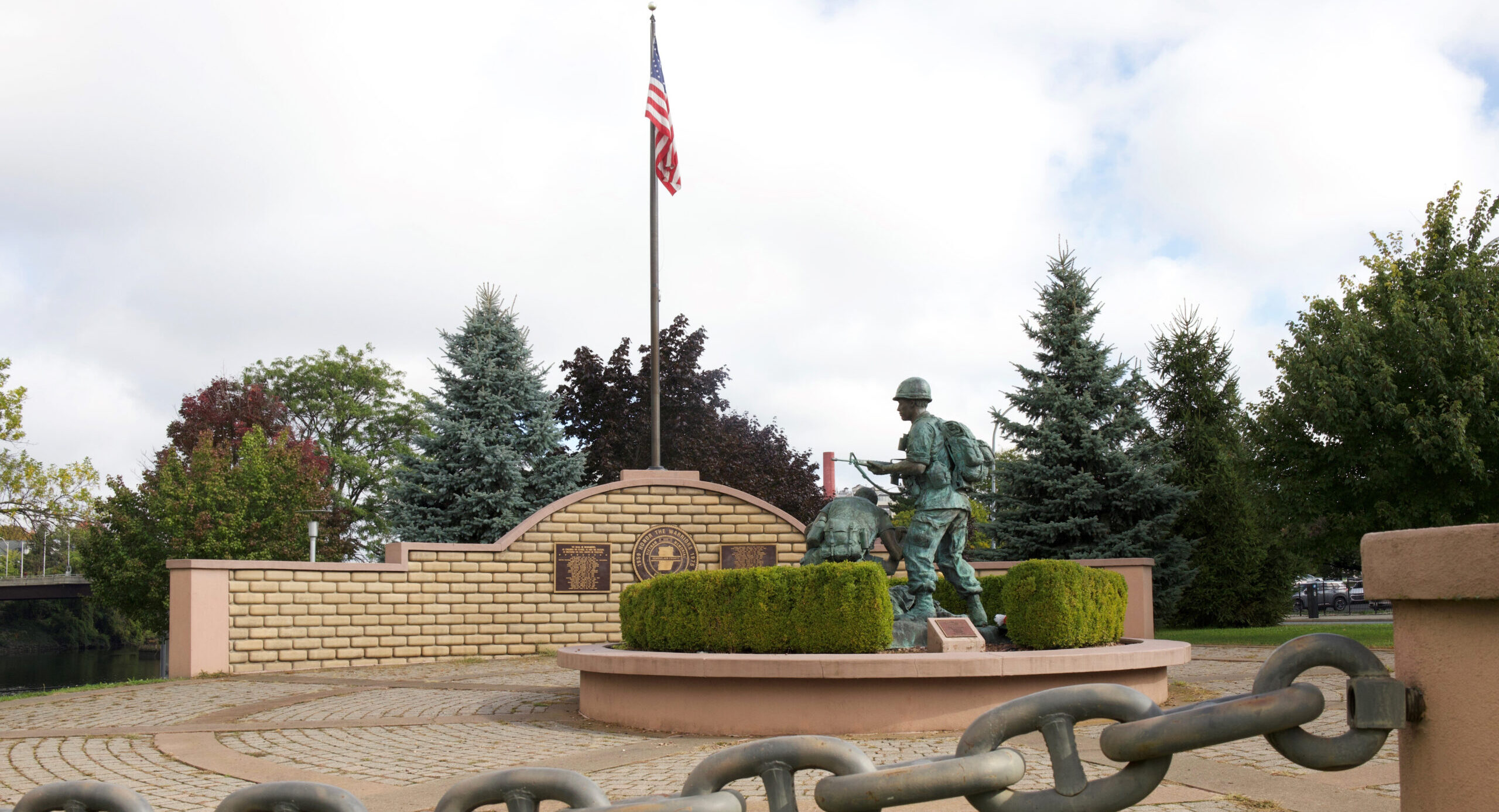 Foreground of Chainlinks with Statue