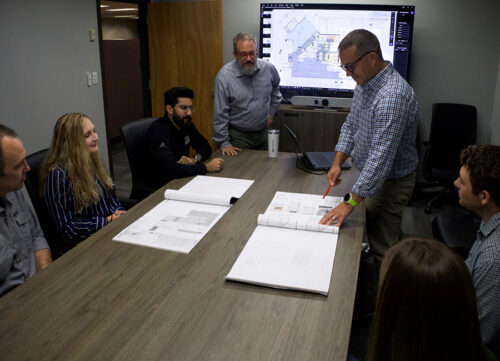 about_0006_Looking-at-Rendering-on-Table-Meeting-2-scaled